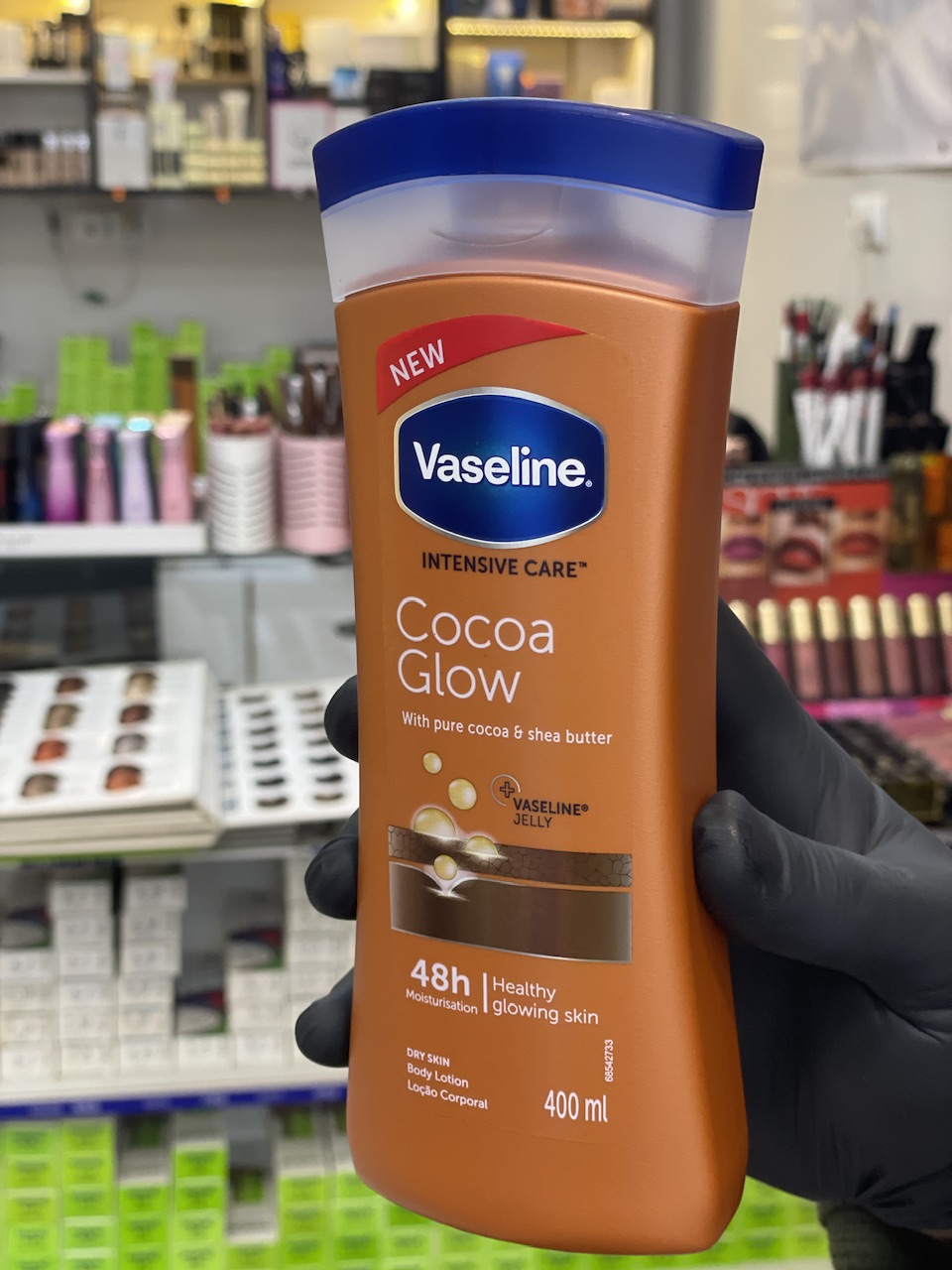 لوسیون بدن وازلین مدل قهوه ای Cocoa Glow (400 میل)